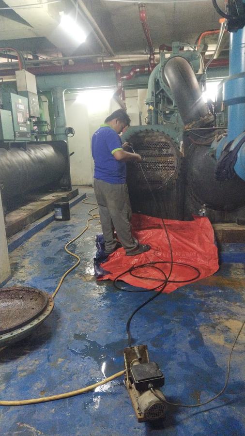 Pump and motor work in a plant room